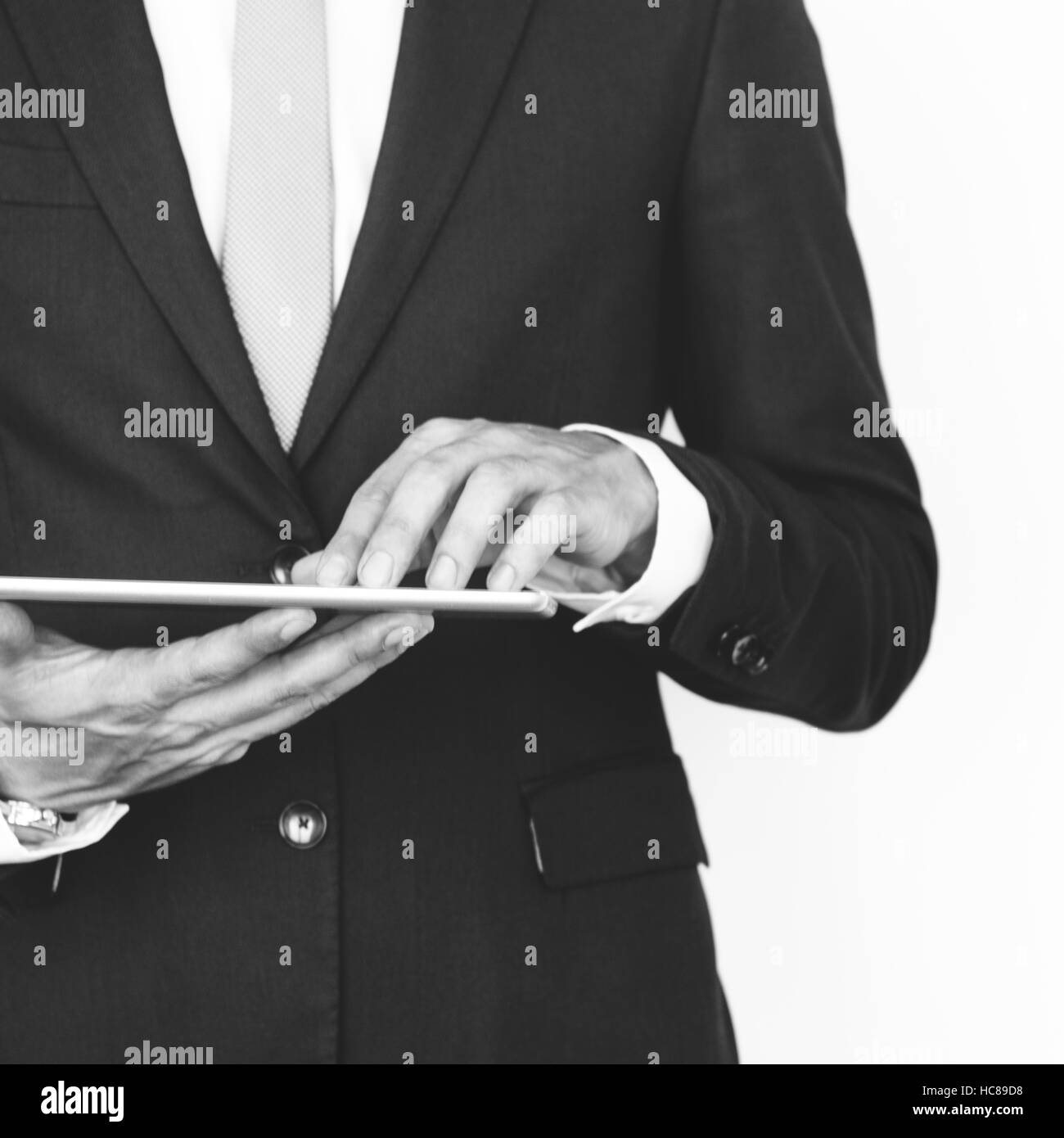 Cropped Business Guy Using Tablet Concept Stock Photo