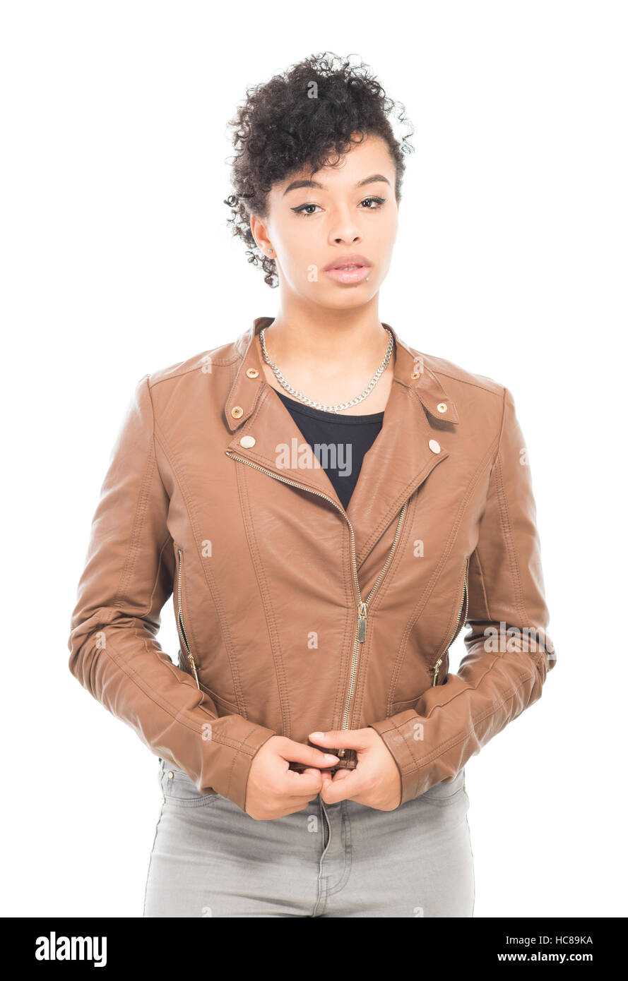 Teenage model with urban fashion clothes isolated on a white background