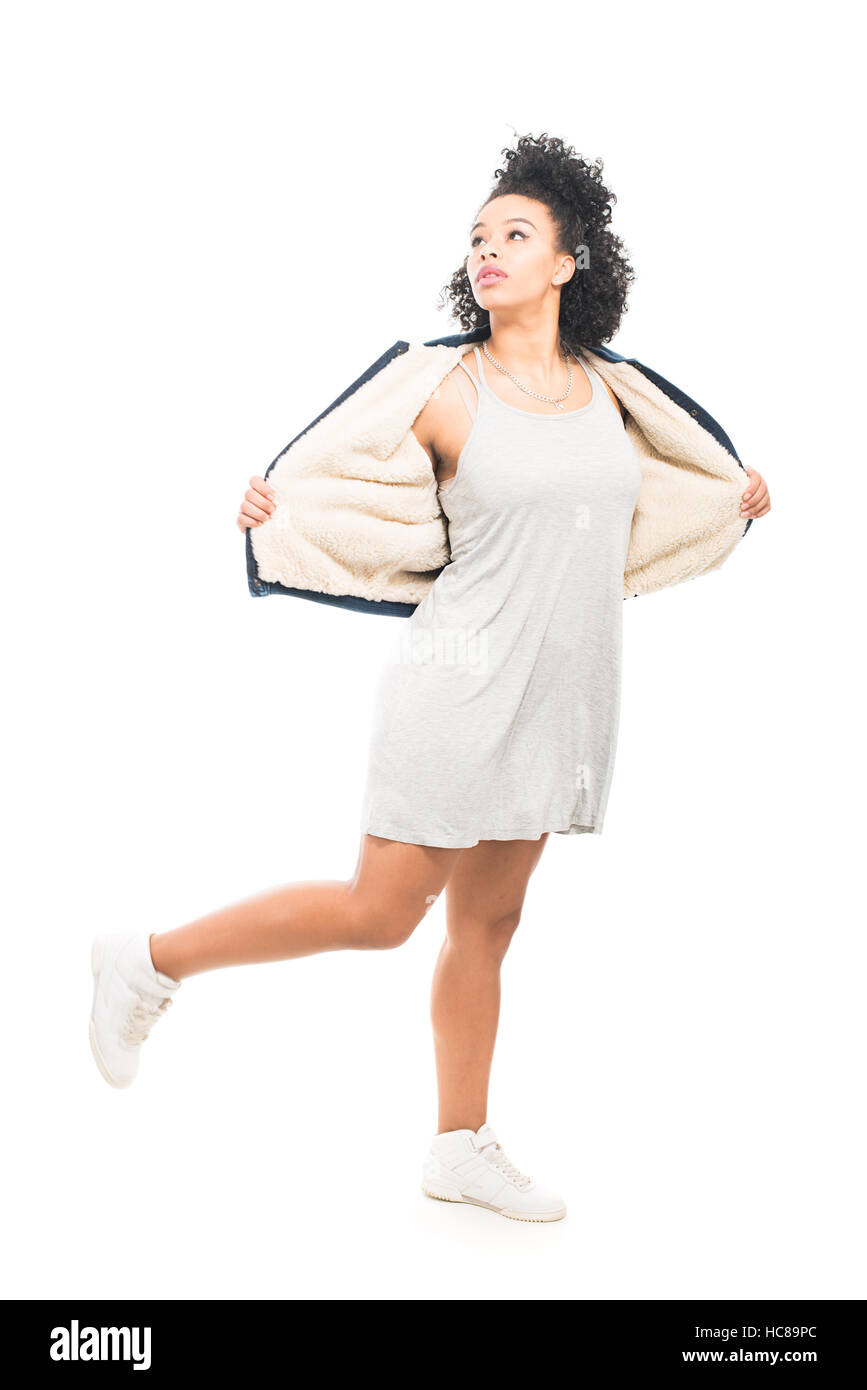 Teenage model with urban fashion clothes isolated on a white background