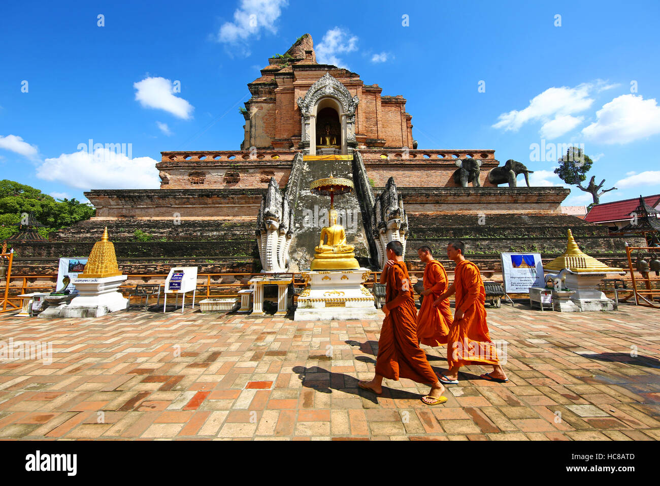 Buddhist monks at Wat Chedi Luang Temple in Chiang Mai, Thailand Stock Photo