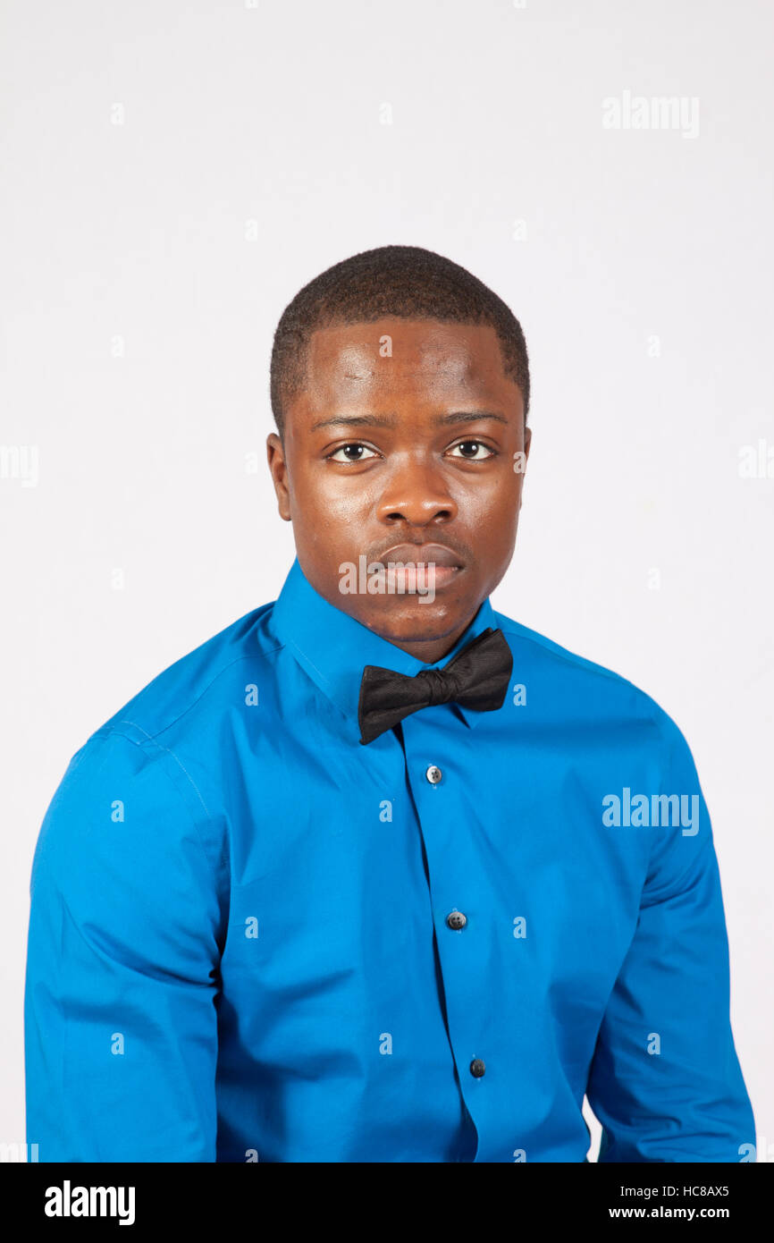 blue dress shirt with bow tie Handsome Black ,man in and looking thoughtful Stock Photo bow tie with normal shirt