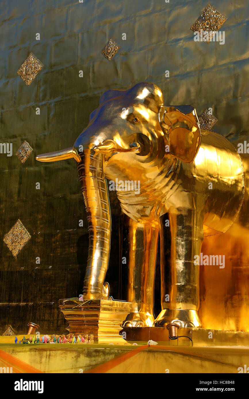 Gold elephant statue on the chedi at Wat Phra Singh Temple in Chiang
