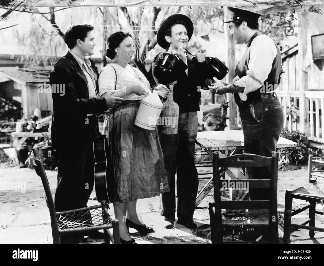 TORTILLA FLAT, from left, John Garfield, Connie Gilchrist, Spencer Tracy, Sheldon Leonard, 1942 Stock Photo