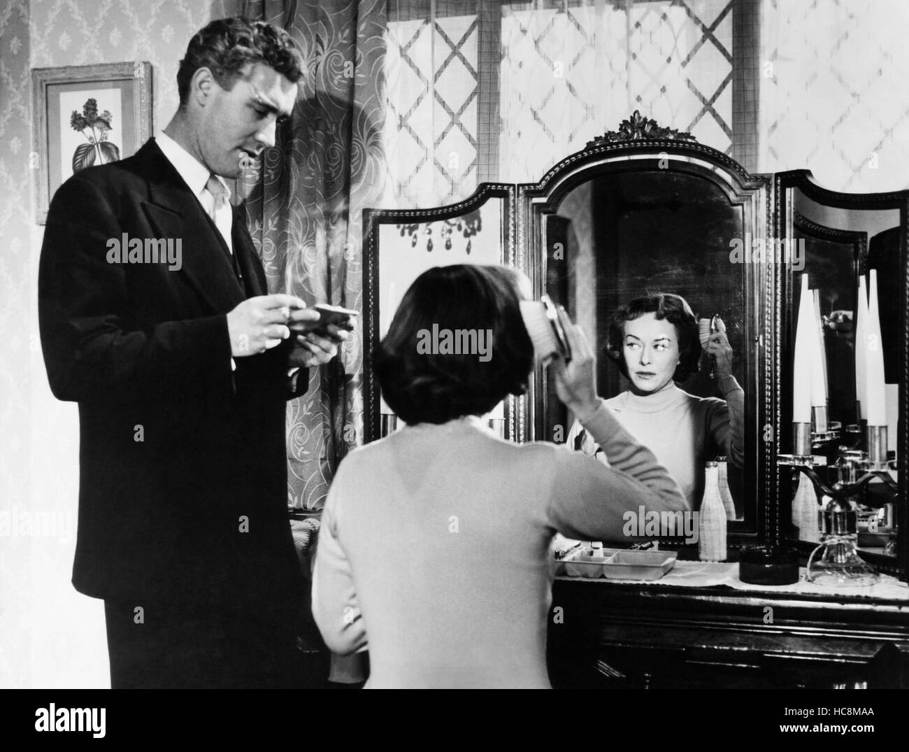 THE UNHOLY FOUR (aka THE STRANGER CAME HOME), from left, Patrick Holt,  Paulette Goddard, 1954 Stock Photo - Alamy