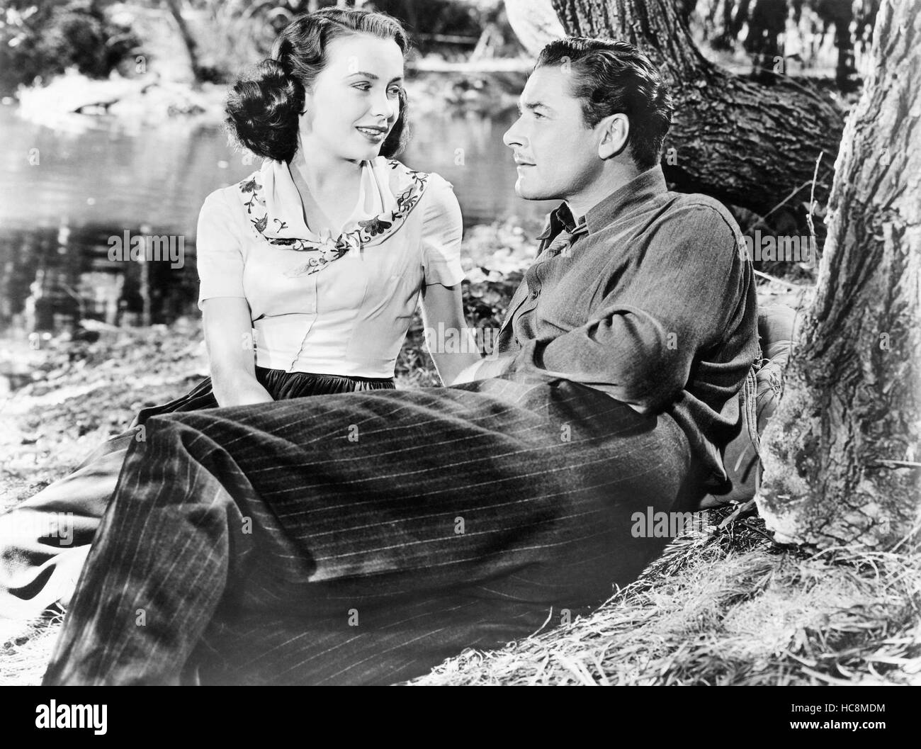 UNCERTAIN GLORY, from left: Jean Sullivan, Errol Flynn, 1944 Stock ...