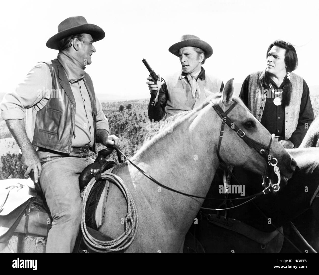 THE WAR WAGON, from left, John Wayne, Kirk Douglas, Howard Keel, 1967