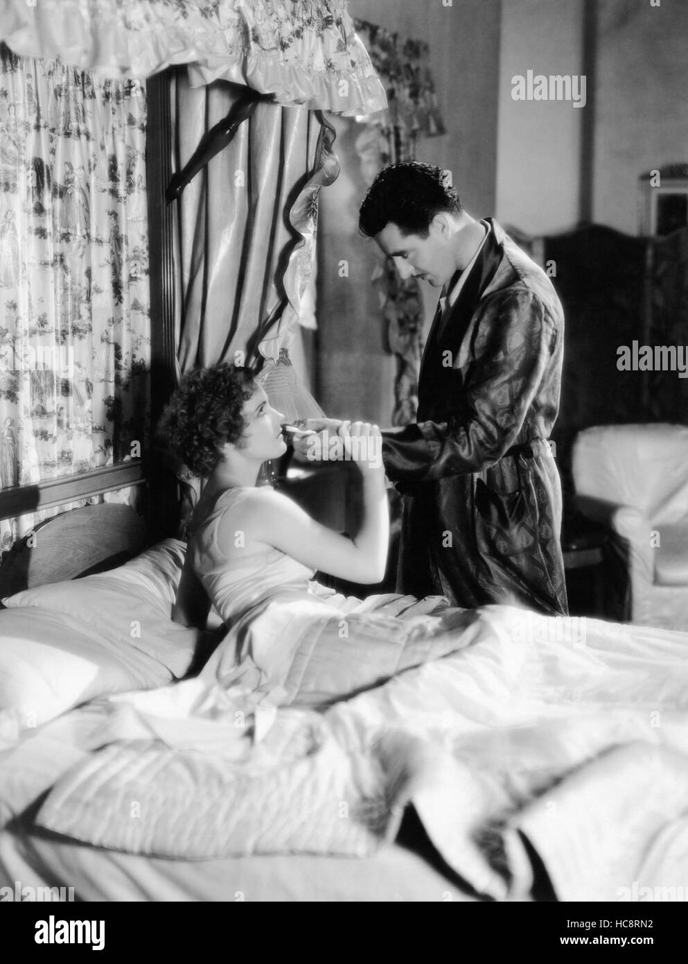 WEST OF BROADWAY, from left, Lois Moran, John Gilbert, 1931 Stock Photo ...