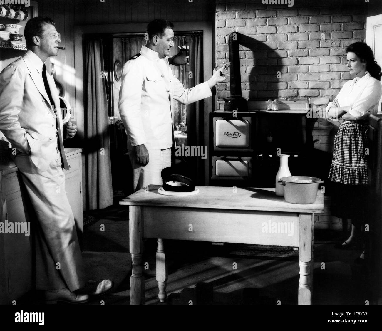THE WINGS OF EAGLES, from left, Dan Dailey, John Wayne, Maureen O'Hara ...