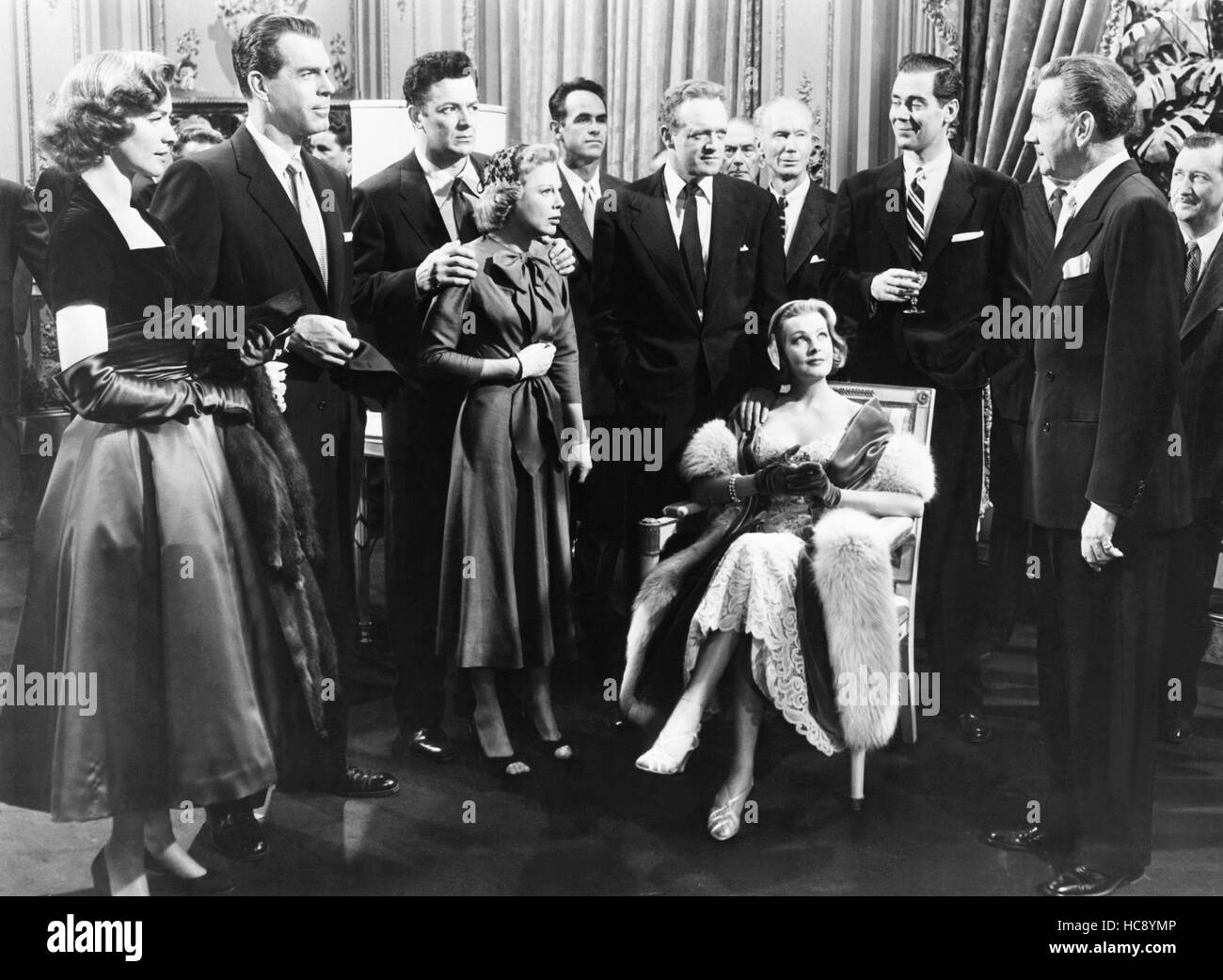 WOMAN'S WORLD, from left: Lauren Bacall, Fred MacMurray, Cornel Wilde ...