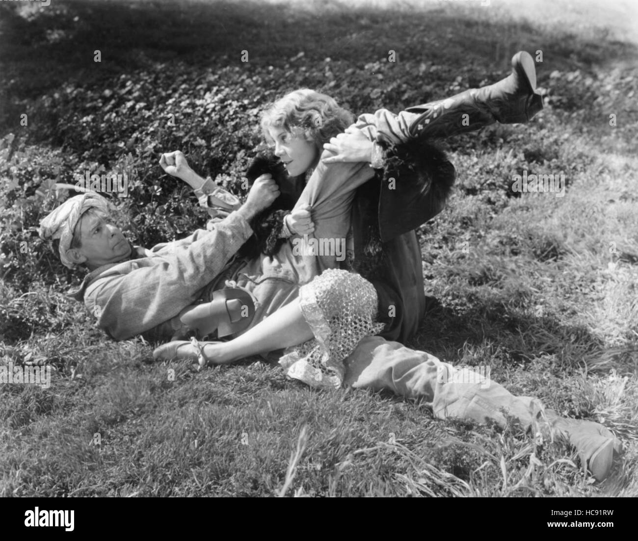 UNDER MONTANA SKIES, from left, Slim Summerville, Nita Martan, 1930