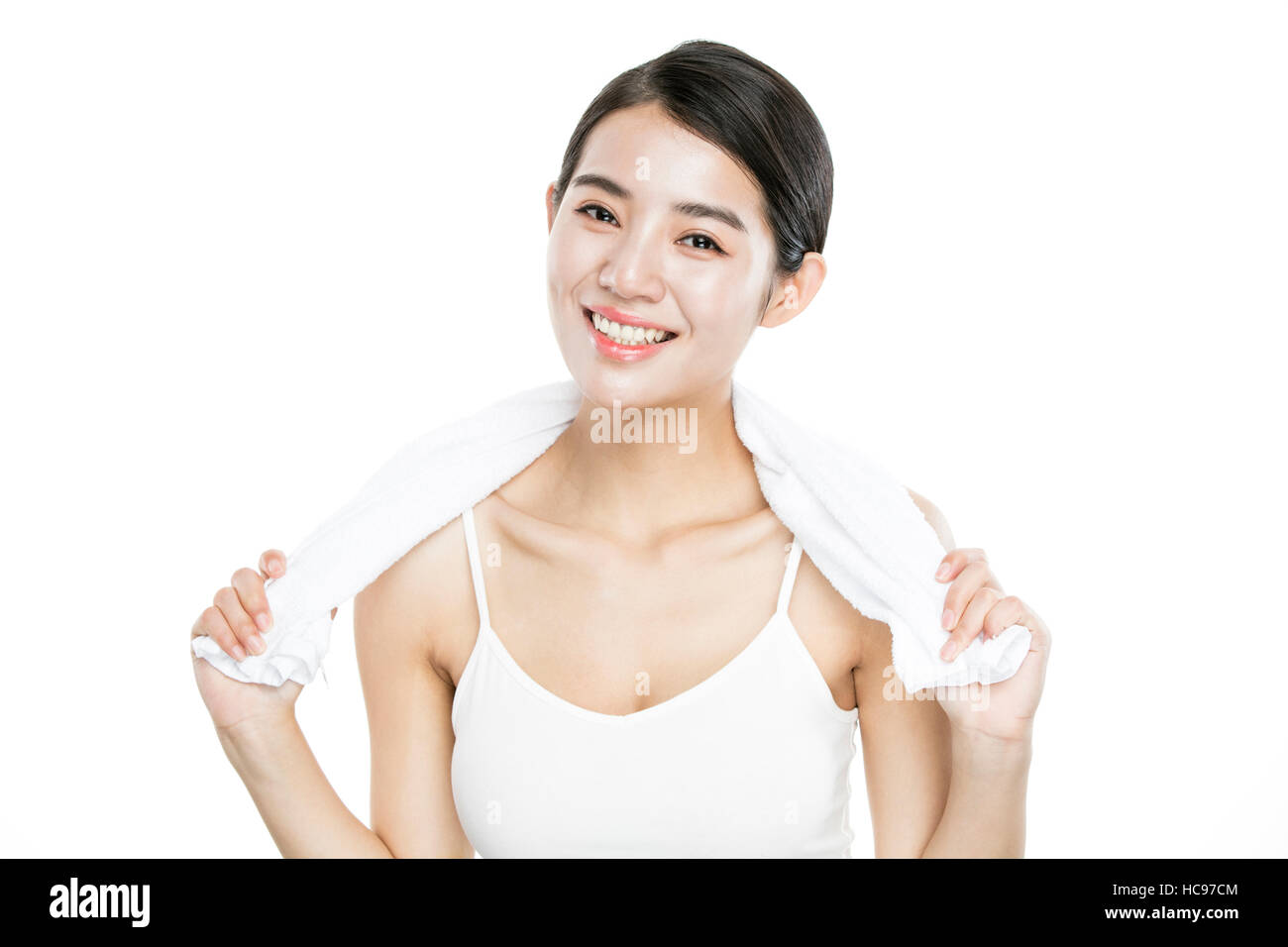Portrait f young smiling woman using towel Stock Photo - Alamy
