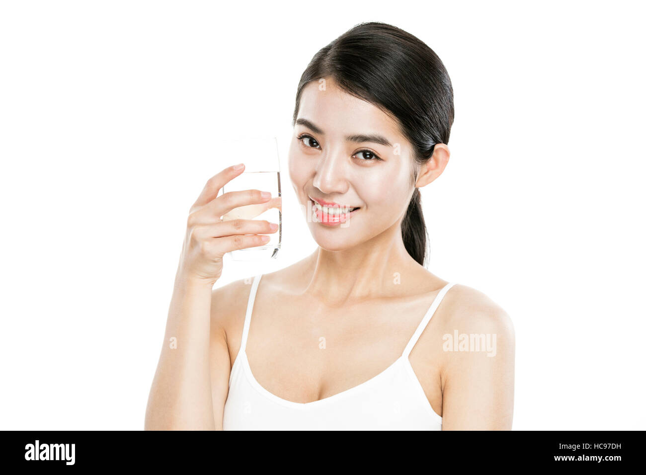 Woman holding a glass of water hi-res stock photography and images - Alamy