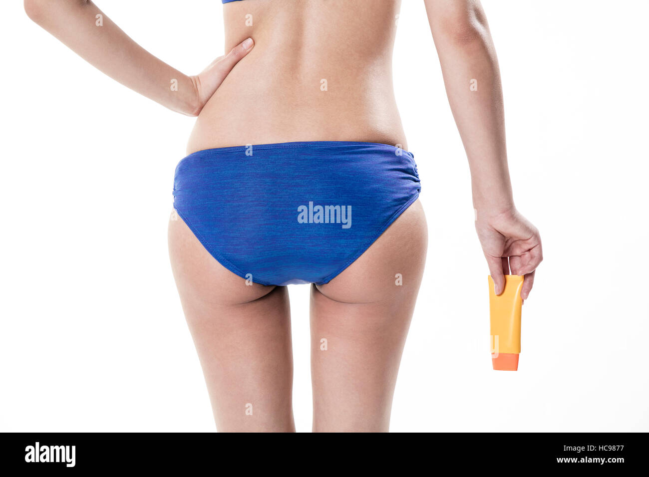 Back of young woman's slim body line in bikini Stock Photo