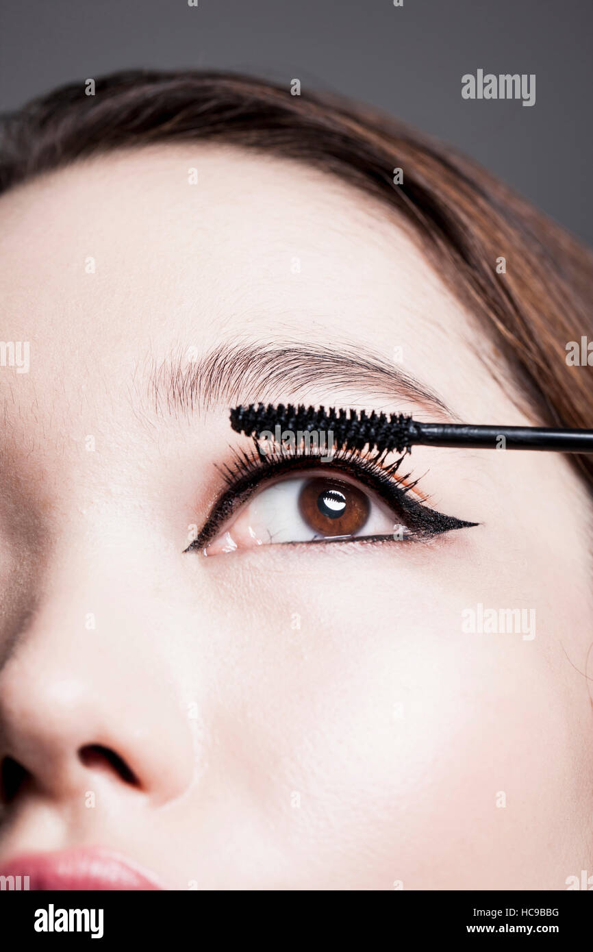 Woman's eye with black mascara and black eyeliner Stock Photo Alamy