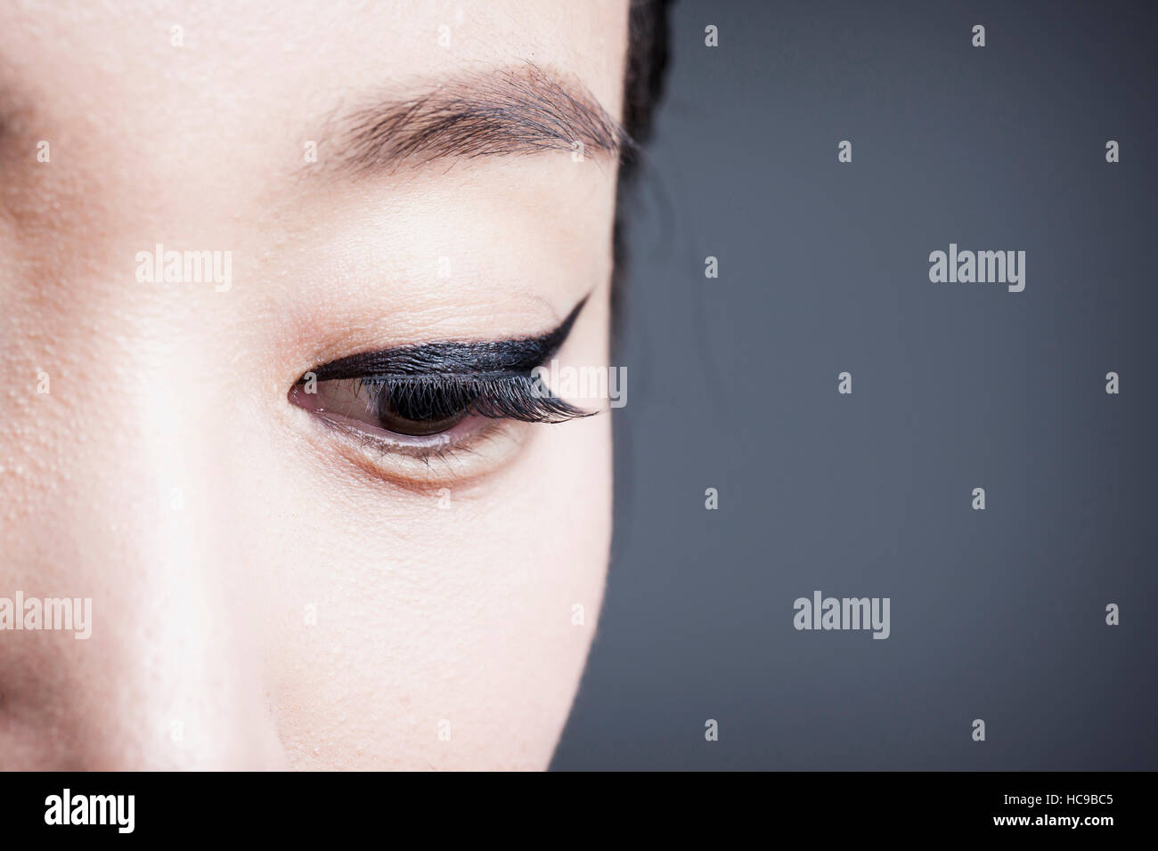 Woman's eye in black eyeliner Stock Photo