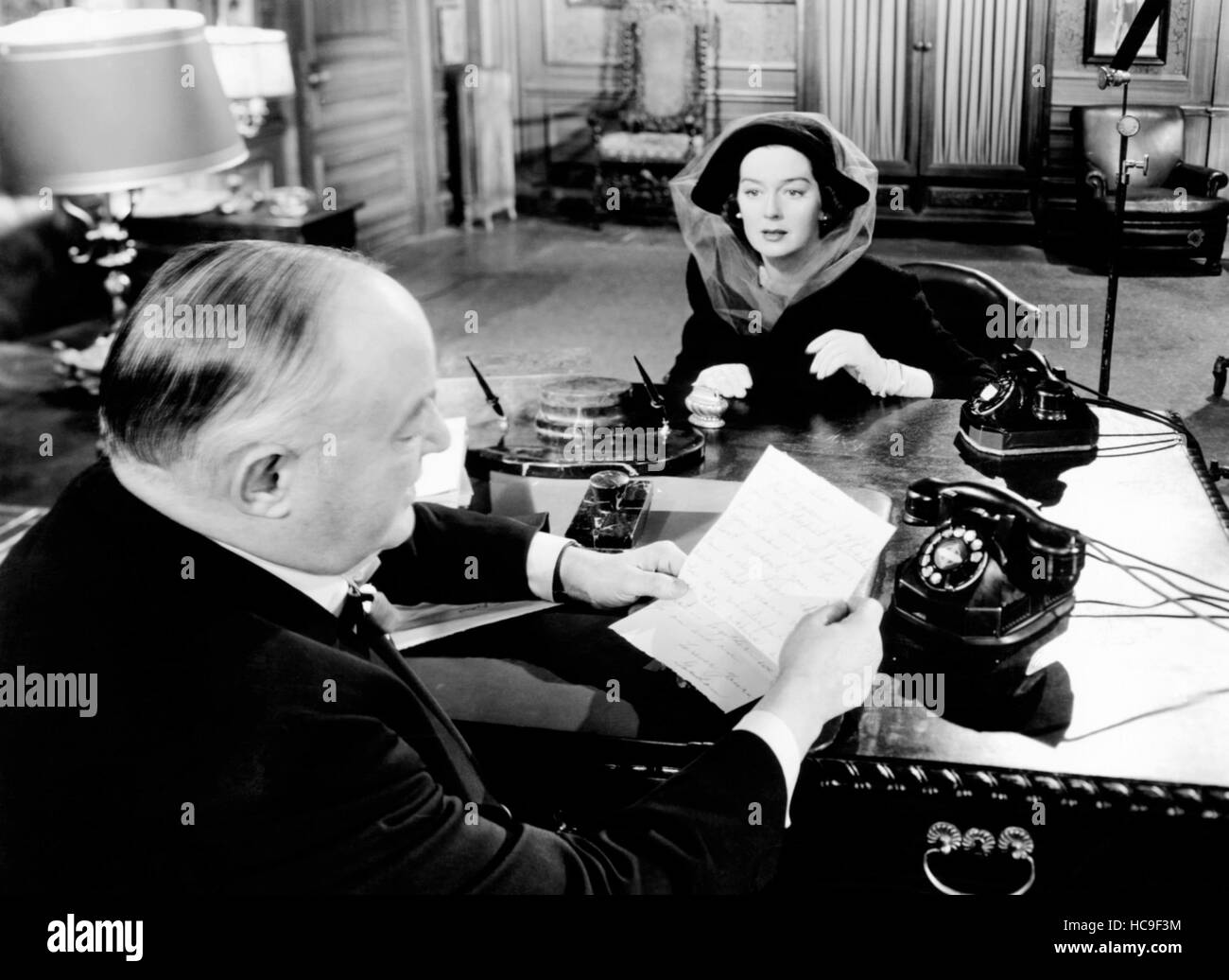 THE VELVET TOUCH, from left, Sydney Greenstreet, Rosalind Russell, 1948