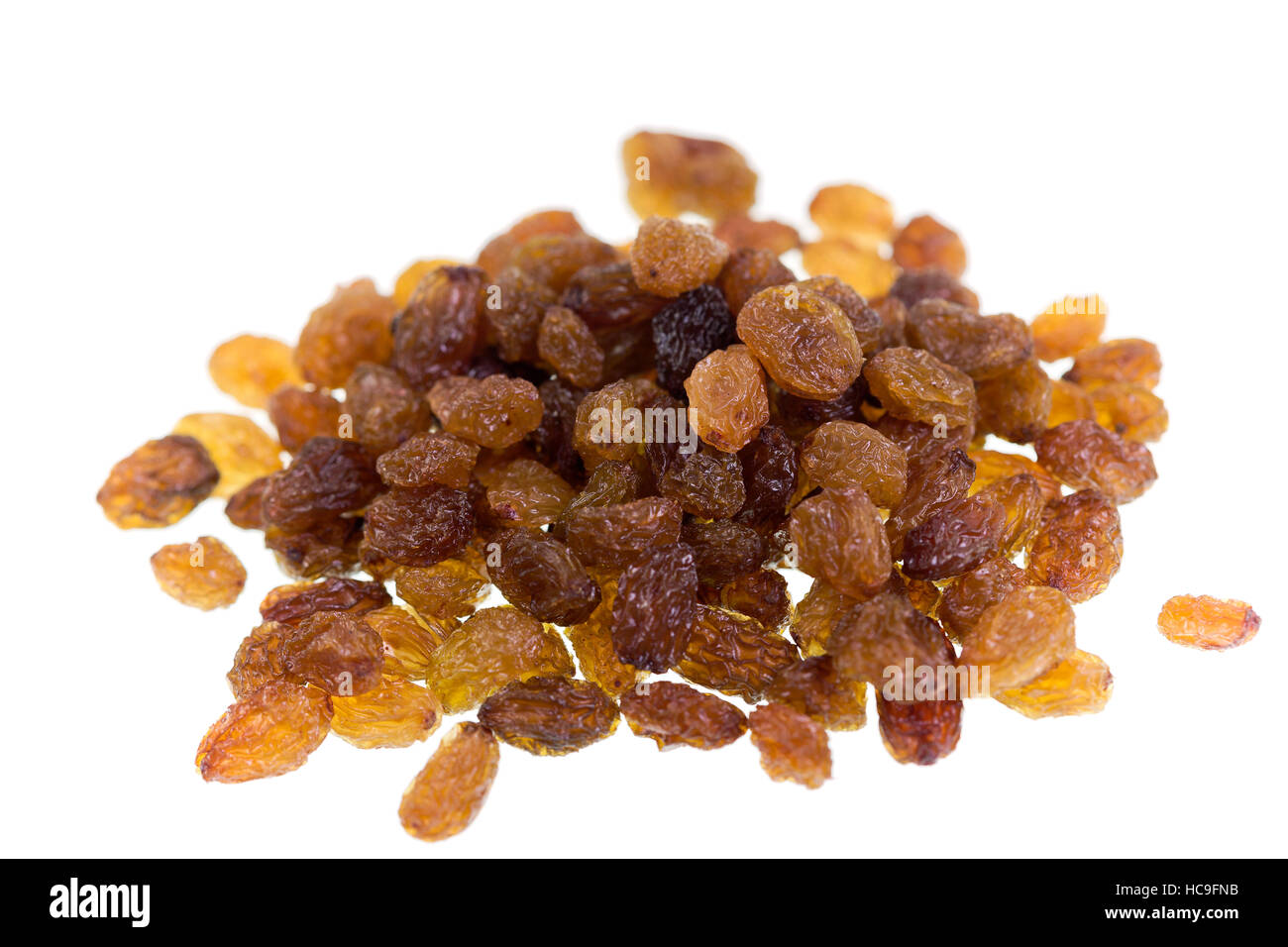 Dried sultanas isolated on white background Stock Photo - Alamy