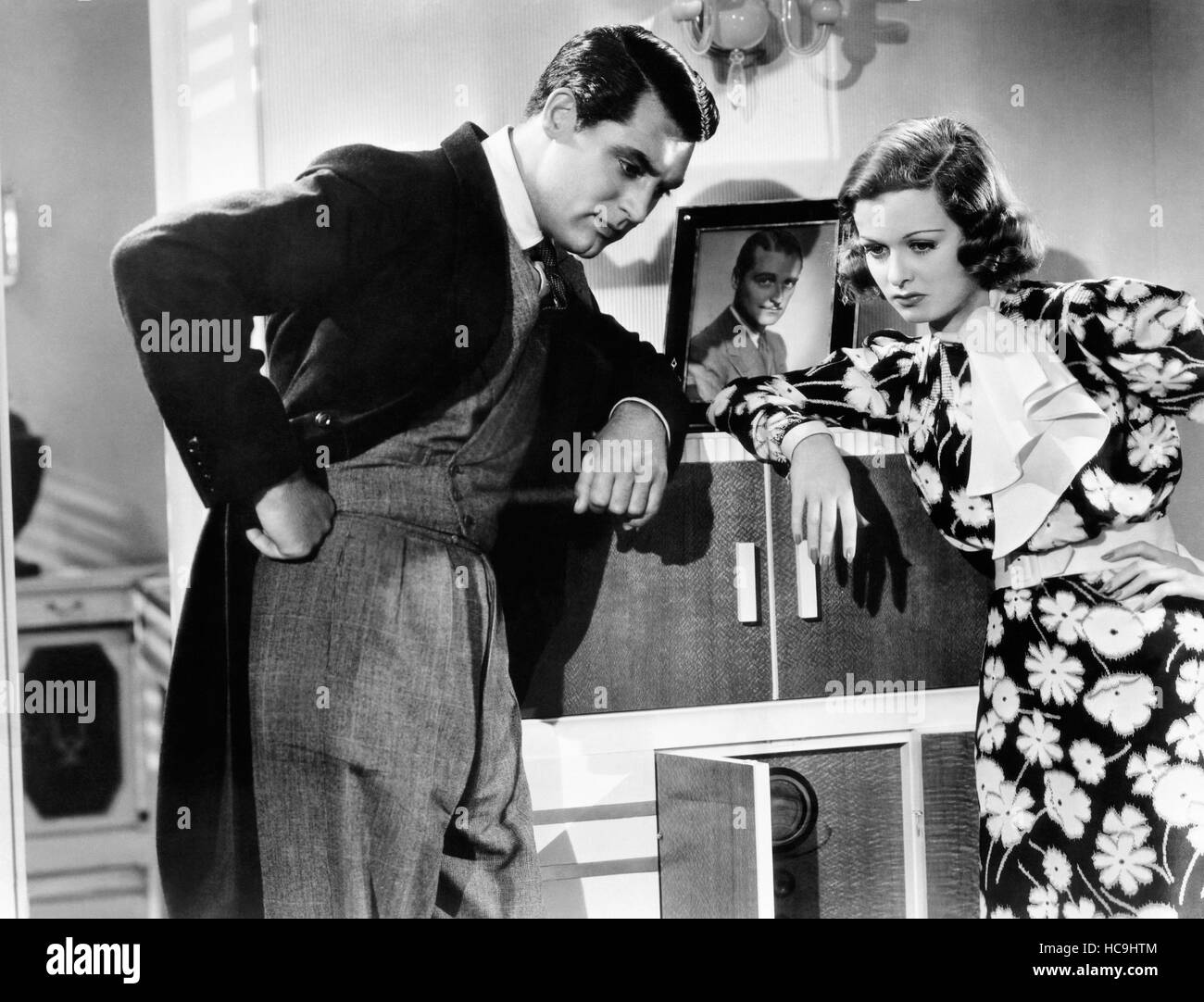 WEDDING PRESENT, from left, Cary Grant, Joan Bennett, (in photo, George ...