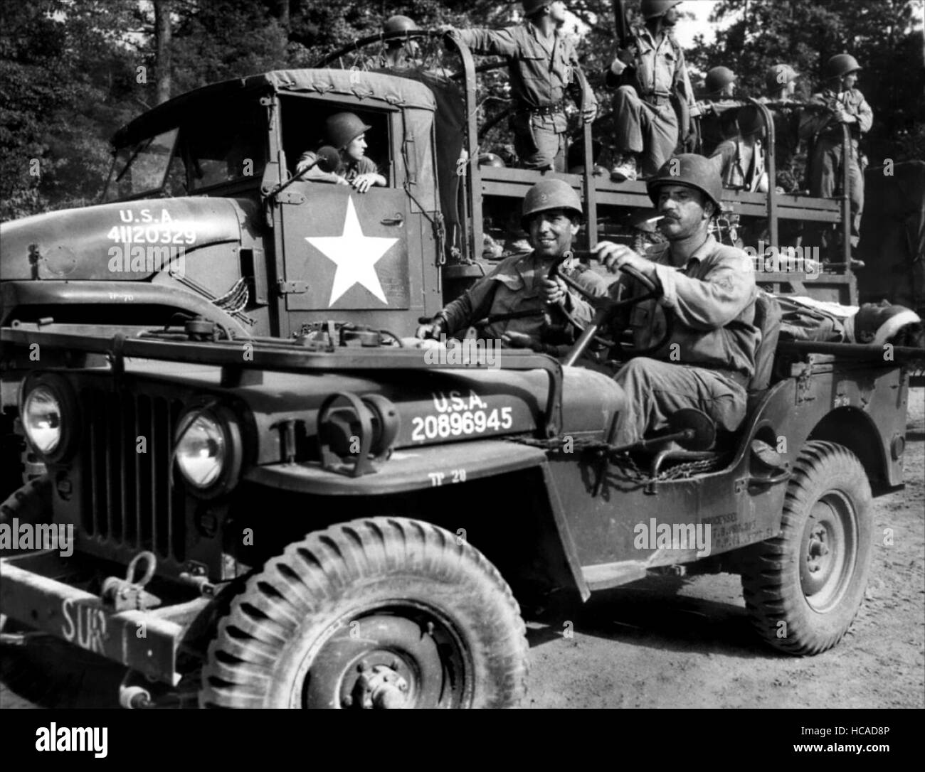 BATTLE CIRCUS, foregound from left Humphrey Bogart, Keenan Wynn, 1953