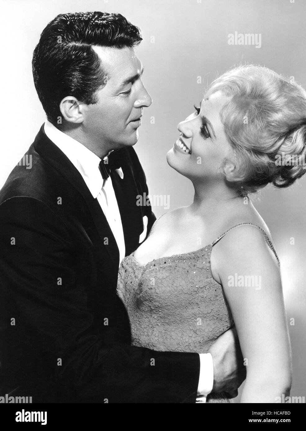BELLS ARE RINGING, from left Dean Martin, Judy Holliday, 1960 Stock