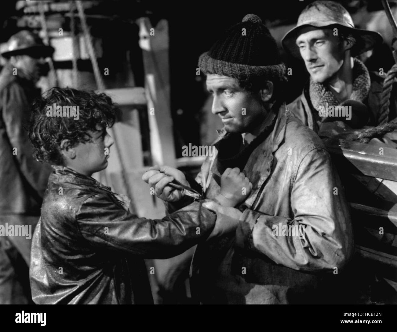 CAPTAINS COURAGEOUS, from left: Freddie Bartholomew, Spencer Tracy ...