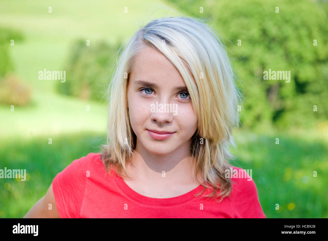 Girl blonde 12 years blue eyes hi-res stock photography and images - Alamy