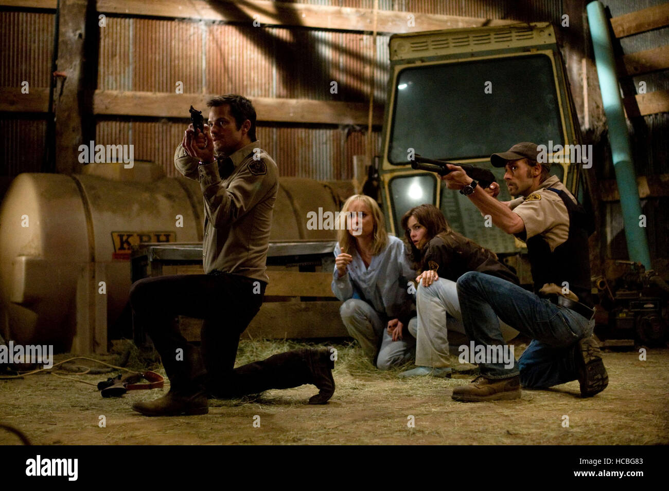 THE CRAZIES, from left: Timothy Olyphant, Radha Mitchell, Danielle Panabaker, Joe Anderson, 2009. ph: Saeed Adyani/©Overture Stock Photo