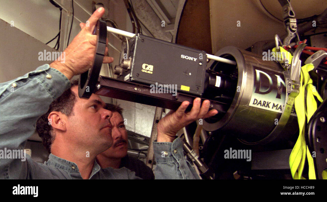 GHOSTS OF THE ABYSS, crew member preparing camera, Mike Cameron, 2003, (c)Walt Disney/courtesy Everett Collection Stock Photo