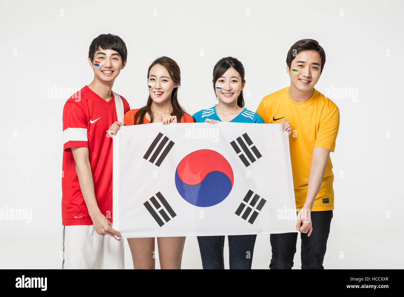 Young smiling people with Korean flag cheering Stock Photo Alamy