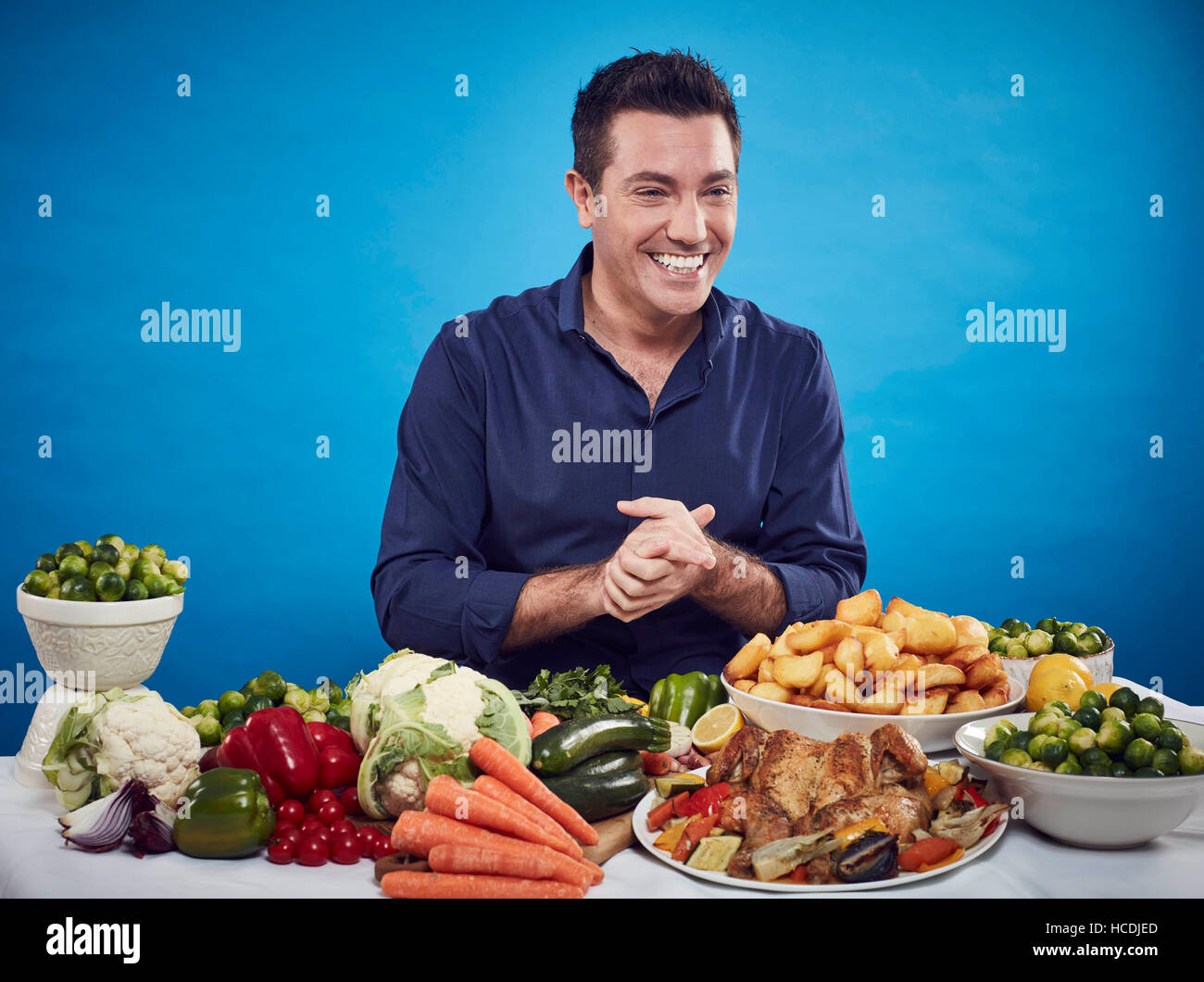 EDITORIAL USE ONLY Celebrity chef Gino D'Acampo makes a roast dinner