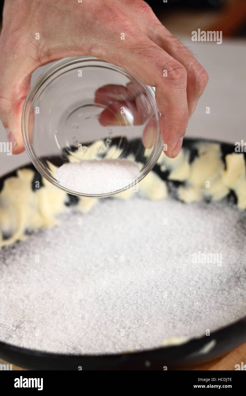 Sprinkle sugar over frying pan. Making Apple Tarte Tatin with Cinnamon