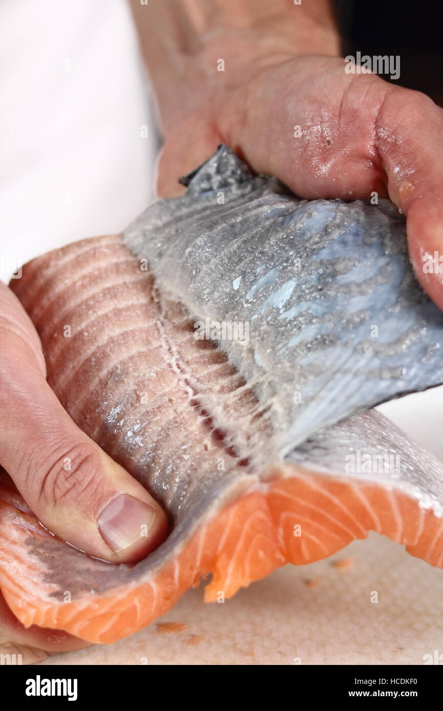 Removing Skin from Salmon Fillet. Making Salmon in Puff Pastry Series