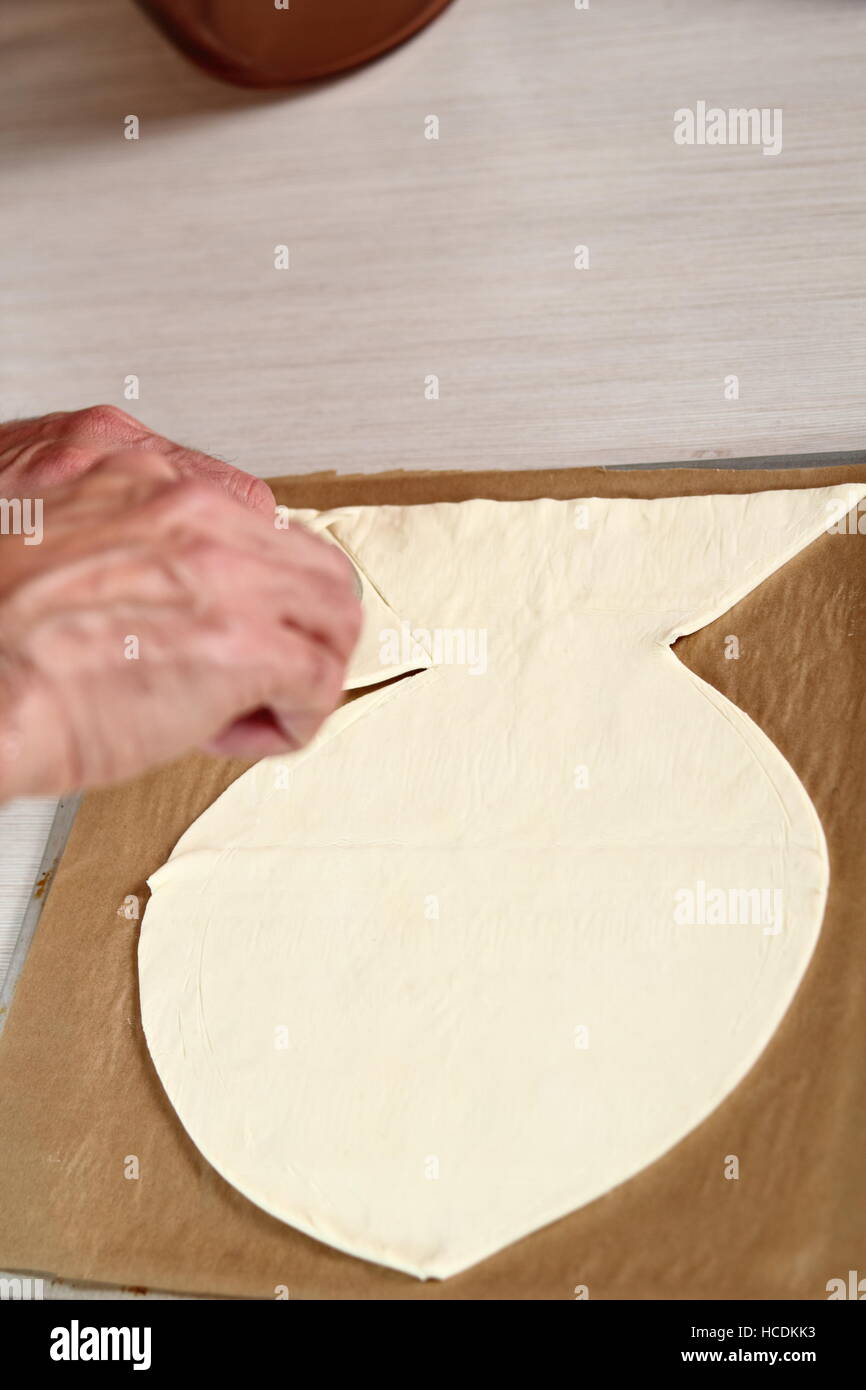Removing Excess of Puff Pastry Sheet. Making Salmon in Puff Pastry Series. Stock Photo