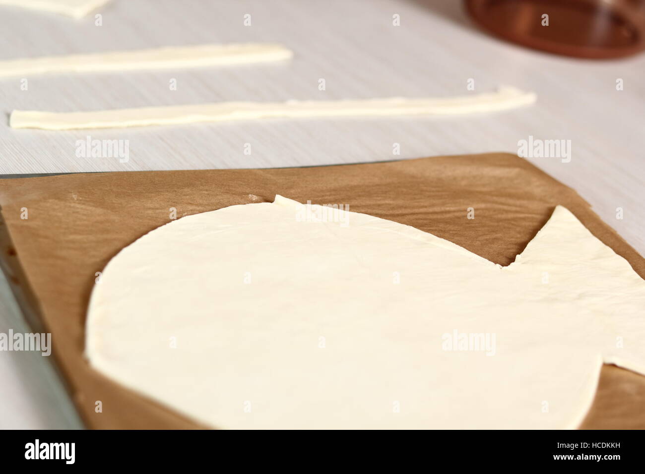 Puff Pastry Fish Shape . Making Salmon in Puff Pastry Series Stock