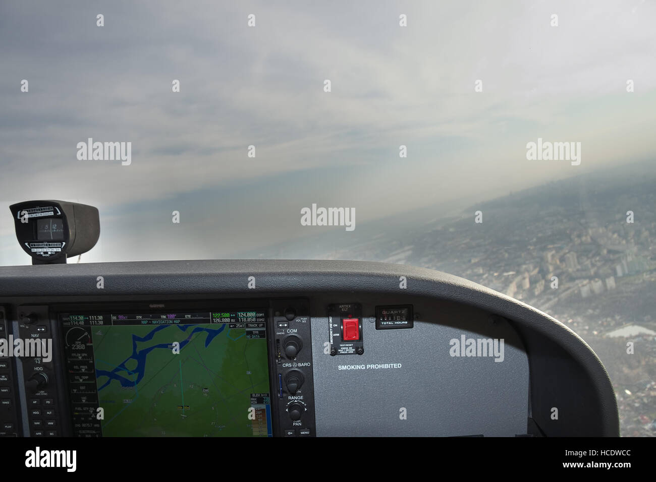 Kiev, Ukraine - November 12, 2010: View from the Cessna 172 Skyhawk during the flight over the city with cloudy weather conditions Stock Photo