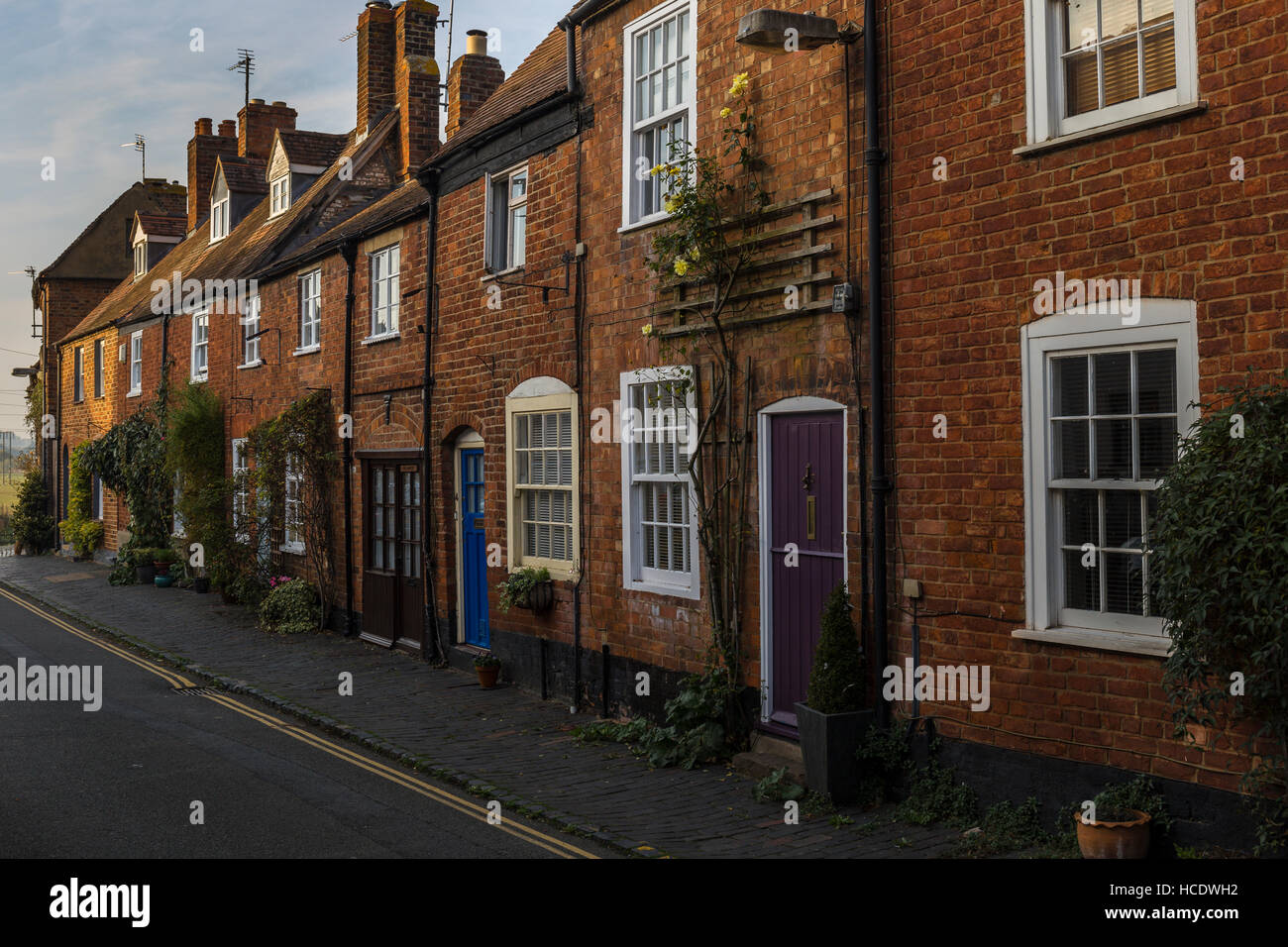 Row off Red-Brick terraced cottages  in Mill Street, Tewkesbury Stock Photo