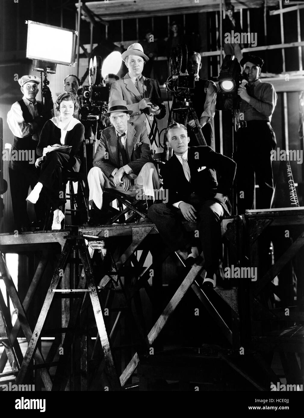 GOING HOLLYWOOD, Stuart Erwin (standing center), Ned Sparks (seated ...