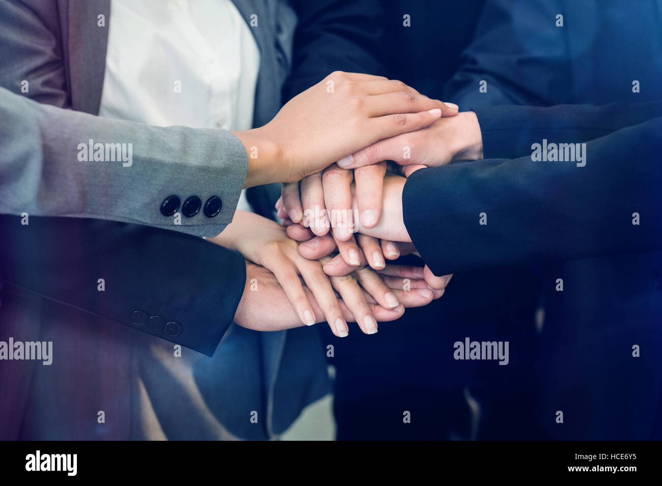 Close-up of businesspeople stacking hands Stock Photo - Alamy