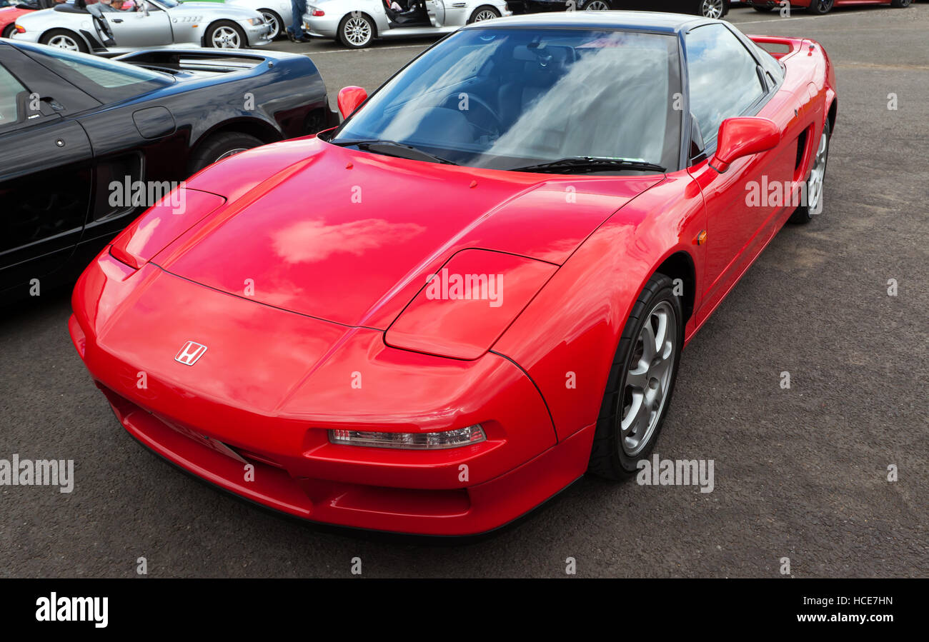Three-quarter front view of 1994 Honda NSX on display in the  Honda NSX  Owners Club Zone of the Silverstone Classic 2016 Stock Photo