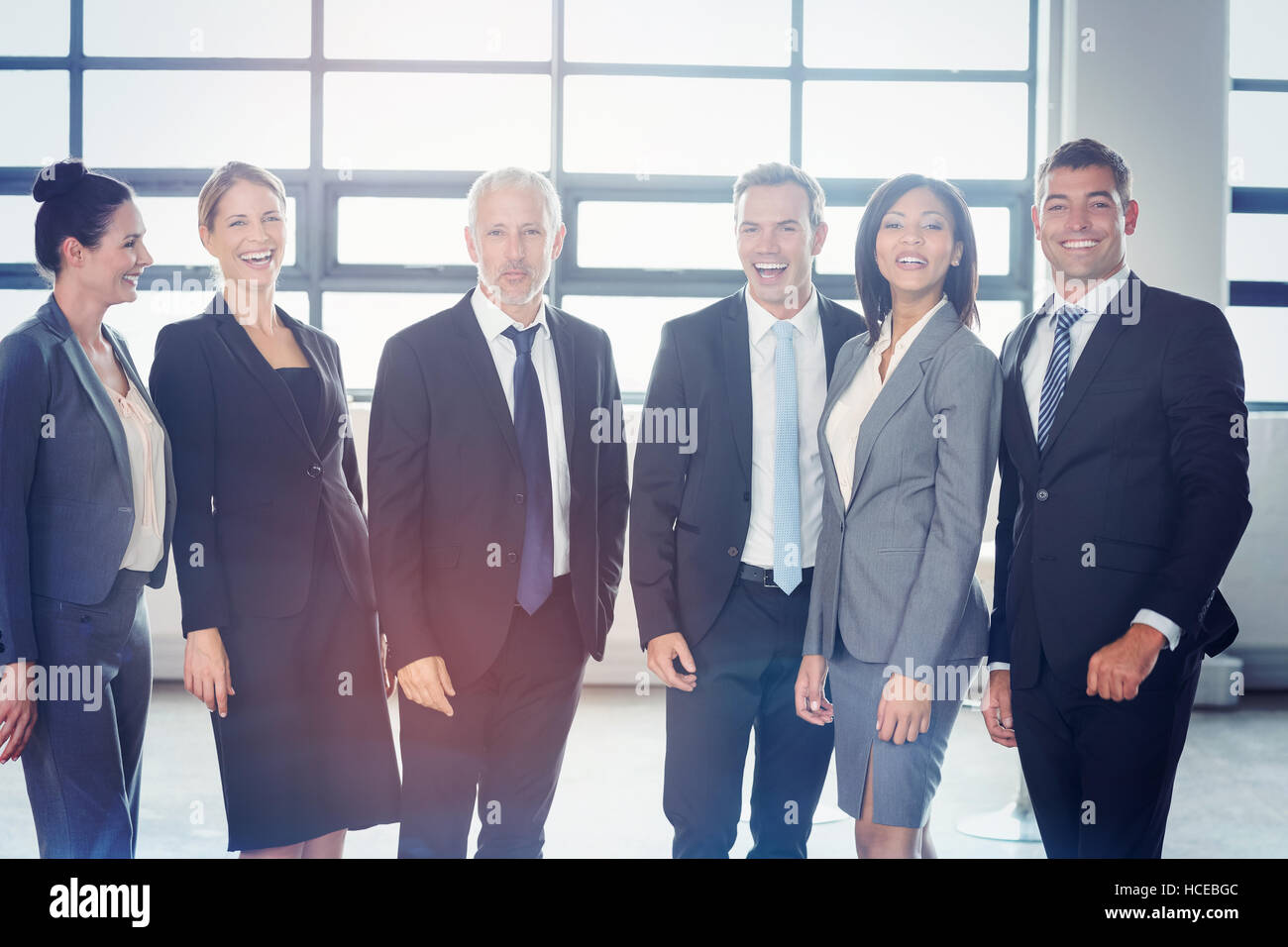 Portrait of confident business team Stock Photo - Alamy