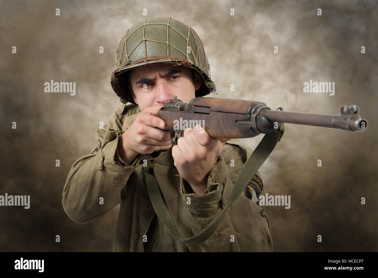 young American soldier ww2 with rifle, attack Stock Photo