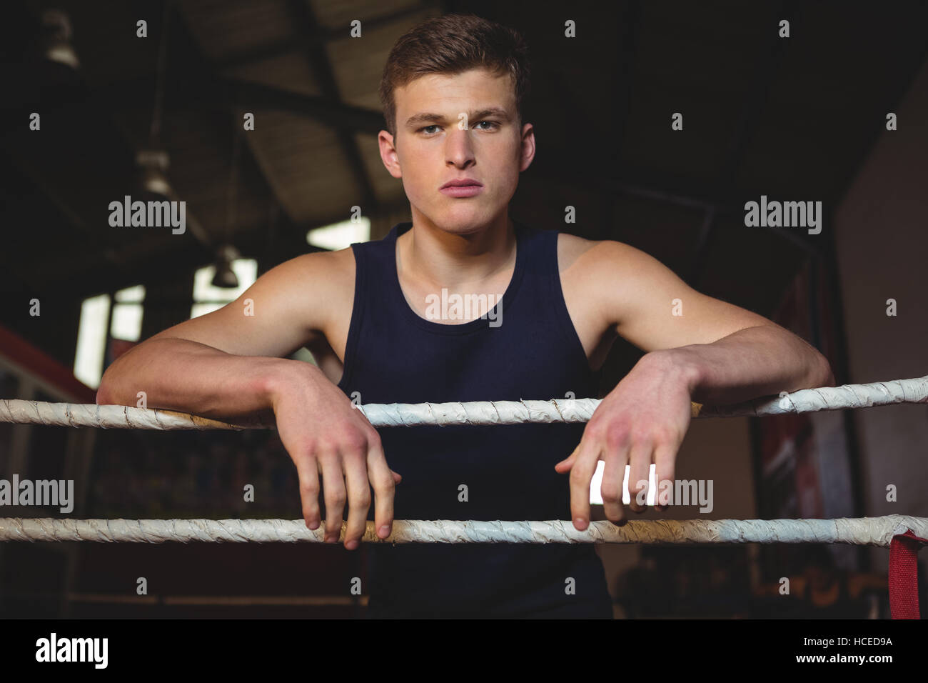 Boxer standing in boxing ring Stock Photo