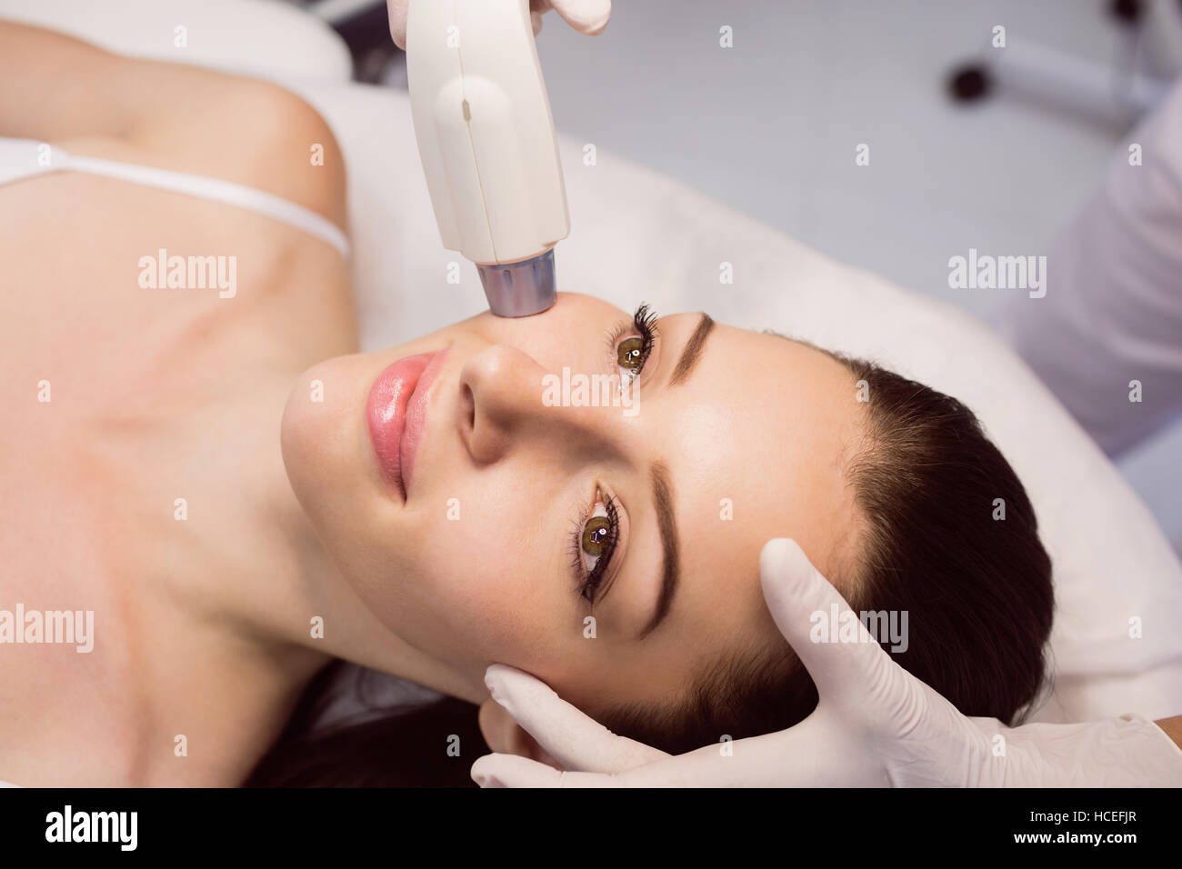 Female patient receiving cosmetic treatment Stock Photo