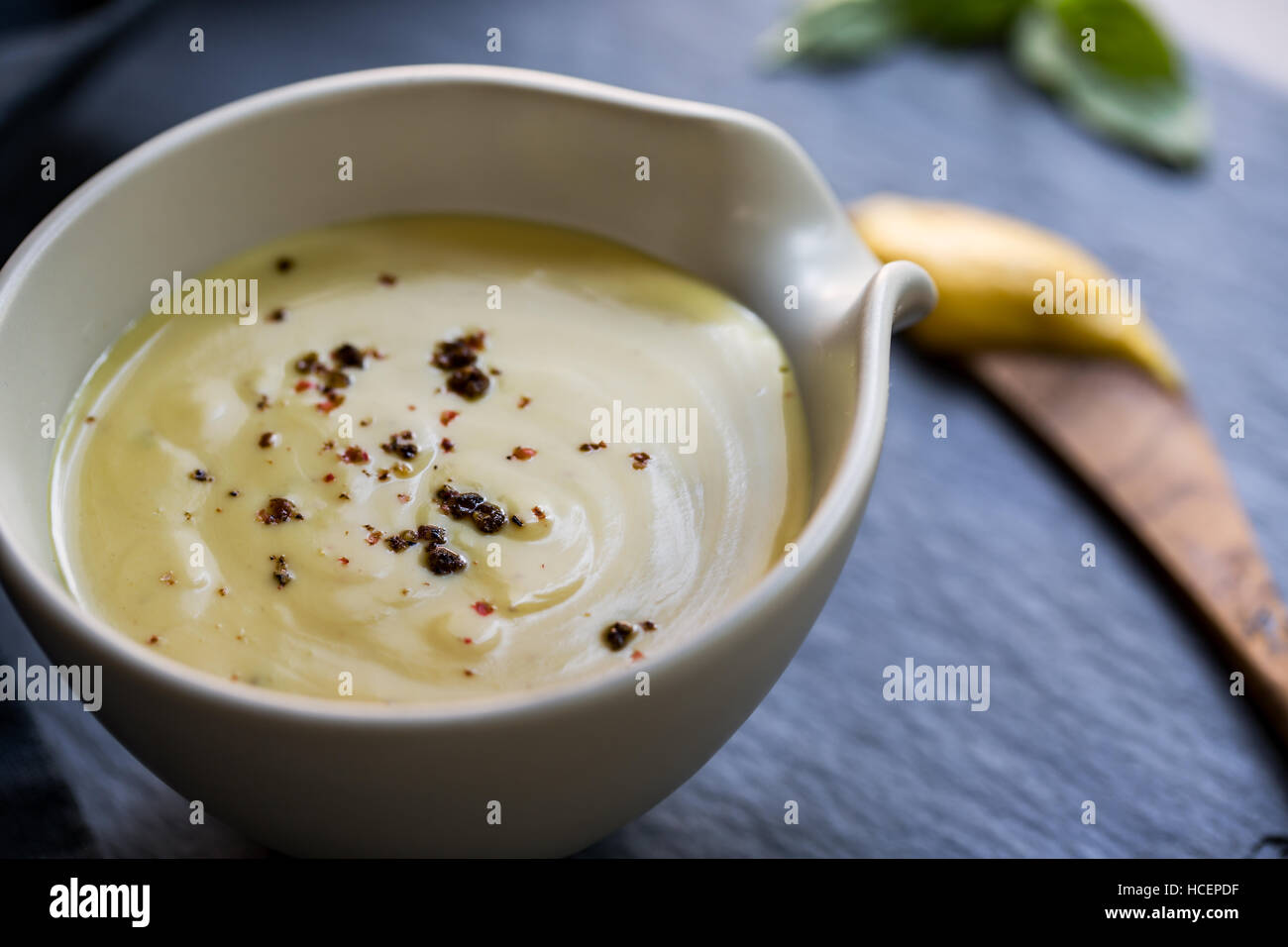 Homemade Creamy Honey Mustard dressing in a bowl Stock Photo