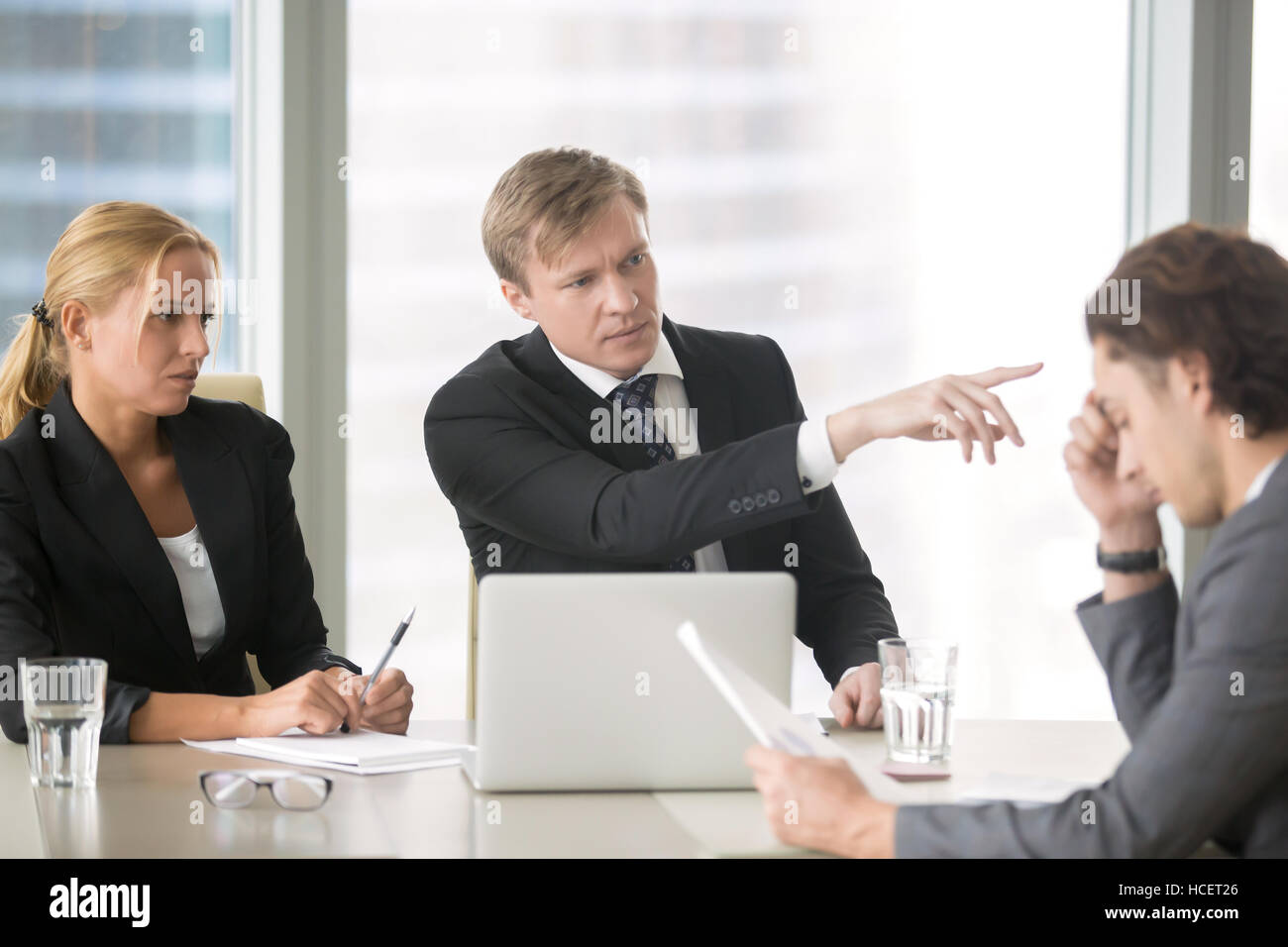 Client firing incompetent contractor Stock Photo