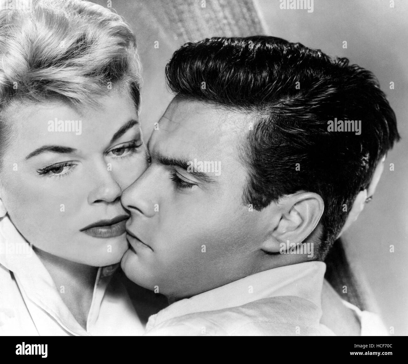 JULIE, from left: Doris Day, Louis Jourdan, 1956 Stock Photo - Alamy