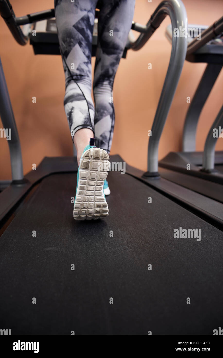 Female legs on a treadmill Stock Photo Alamy