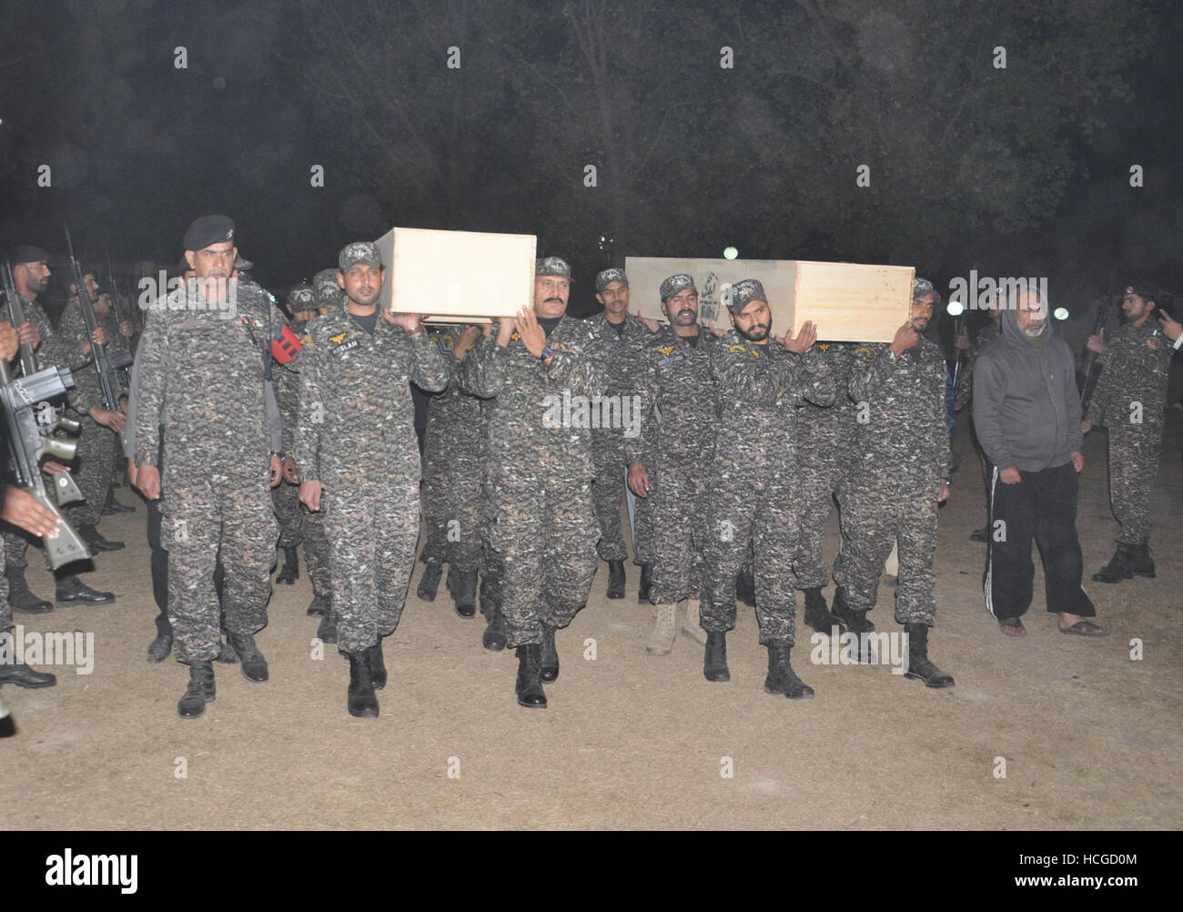Rawalpindi, Pakistan. 08th Dec, 2016. Family Members, Airport Security Force (ASF) staff, officers, local residents offer the funeral prayer for PIA Crash plane Flight PK-661 Captain Saleh Janjua and co-pilot Ahmed Janjua in Rawalpindi. The plane with 47 people on-board crashed near Havelian city of Abbottabad district on Wednesday. Credit:  Zubair Abbasi/Pacific Press/Alamy Live News Stock Photo