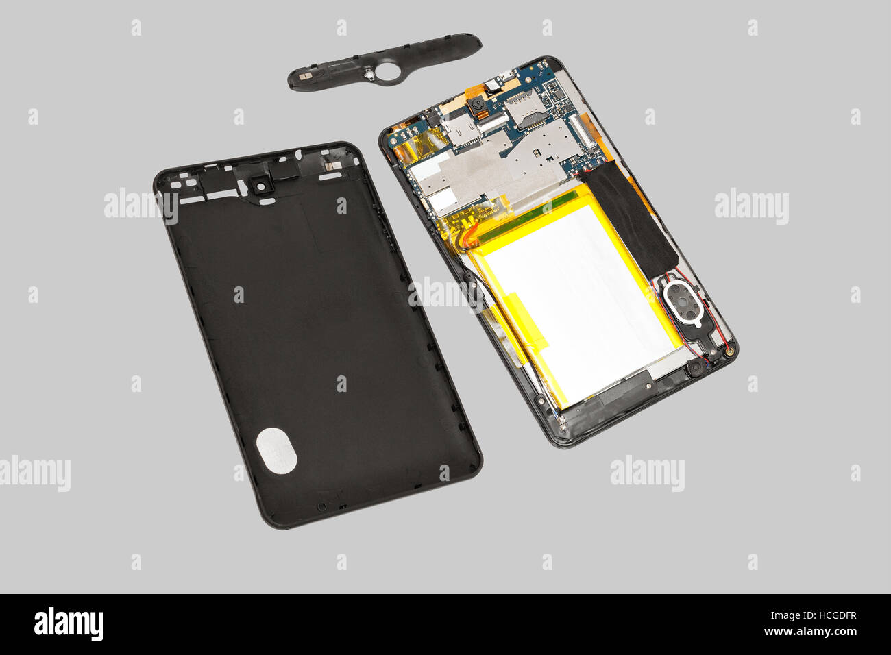 Disassembled tablet computer. Isolated on gray background Stock Photo ...
