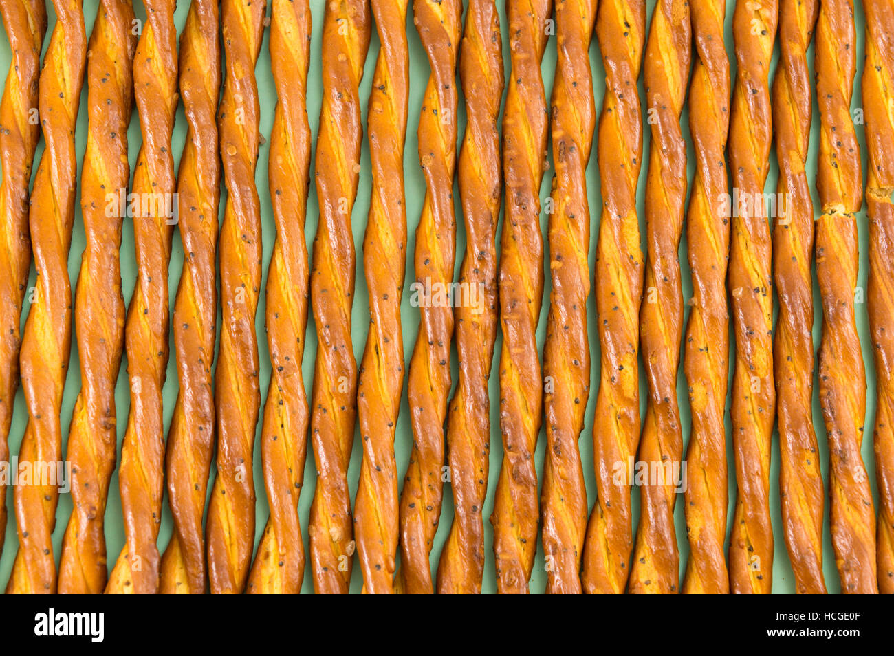 Bunch of salty breadsticks snack background pattern Stock Photo